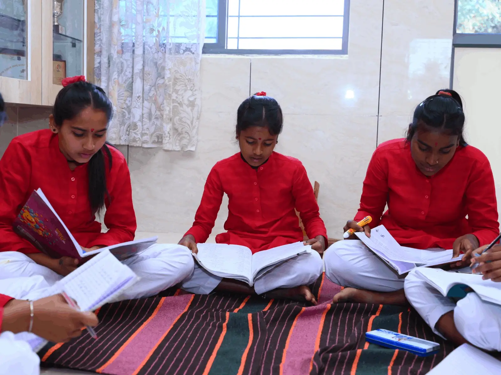 Tribal and rural children learning happily in a classroom environment