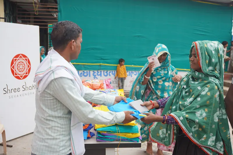 Raincoat distribution to tribal families in Pancha Village - monsoon support initiative